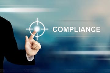 compliance banner with a finger of a person on a icon